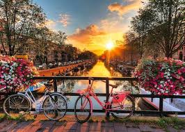 RAVENSBURGER 1000-PIECE PUZZLE Bicycles in Amsterdam