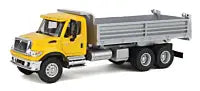 WALTHERS HO International(R) 7600 3-Axle Heavy-Duty Dump Truck - Assembled -- Yellow Cab, Silver Dump Body