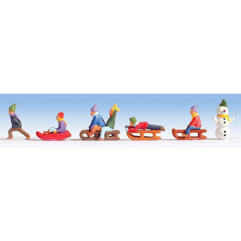 N FIGURES CHILDREN ON SLEDS W/SNOWMAN